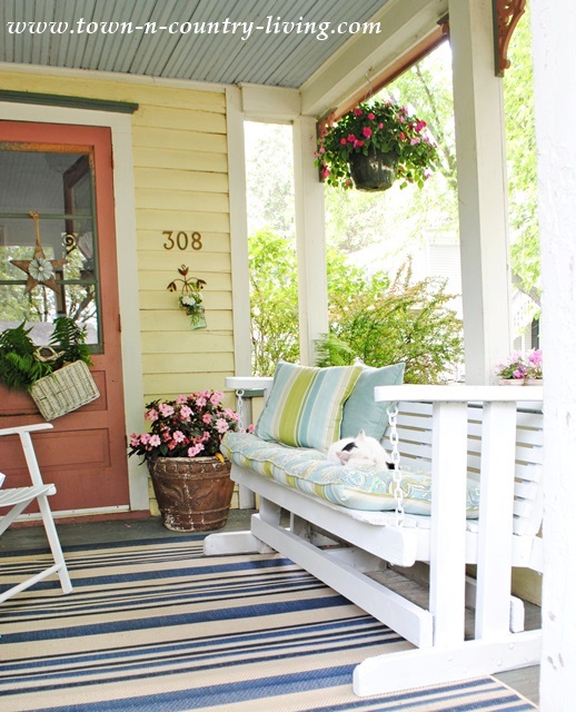 How I Turned My Farmhouse Porch into a Mini Retreat - Town & Country Living