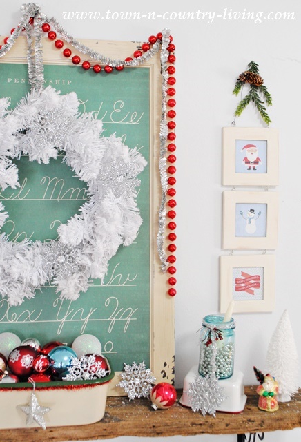 Whimsical Christmas Mantel. Free printables available to create the cute, framed prints.