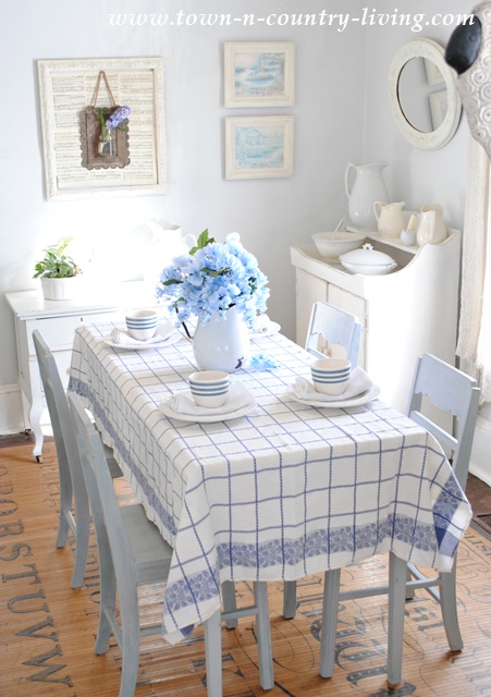 Farmhouse Dining Room dressed for spring in blue and white.