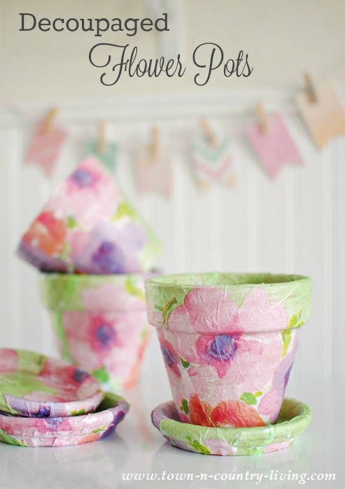 Decoupaged Flower Pots. Transforming ordinary clay pots into something special.