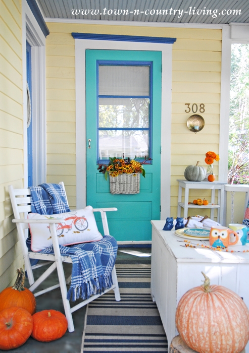 Fall Front Porch with Pumpkins and Flowers