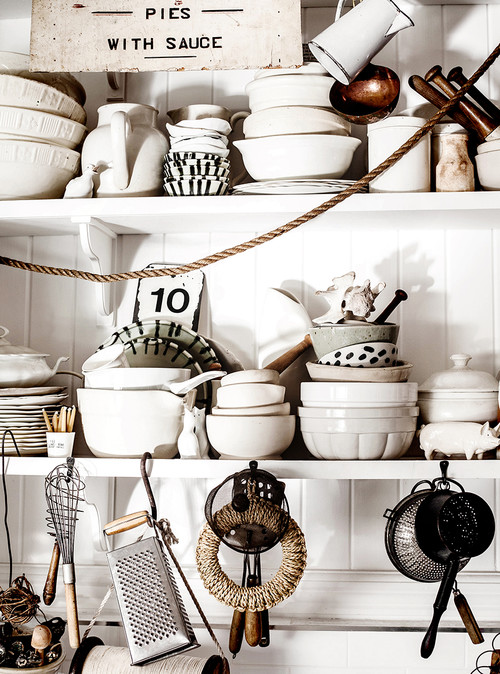 White Bowls and Cookware in Eclectic Kitchen