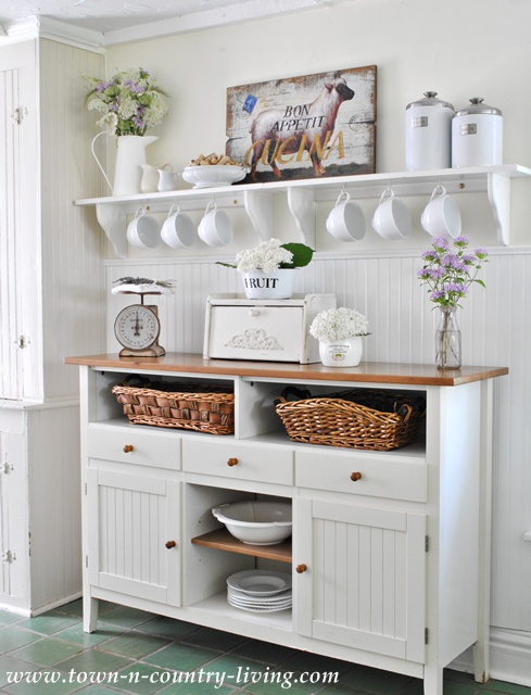 Farmhouse Kitchen Decor with White Sideboard and Shelf