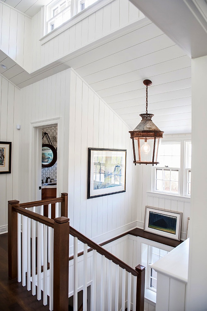 wood and white u-shaped staircase