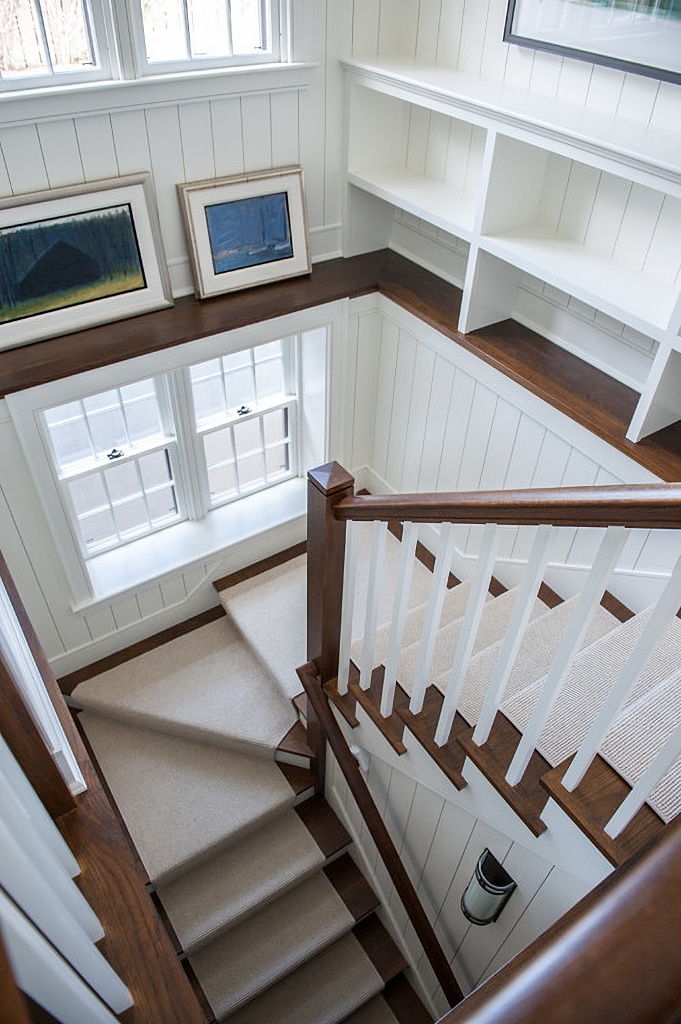 wood and white u-shaped staircase