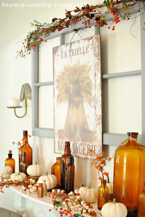 Vintage Fall Mantel with Brown Bottles