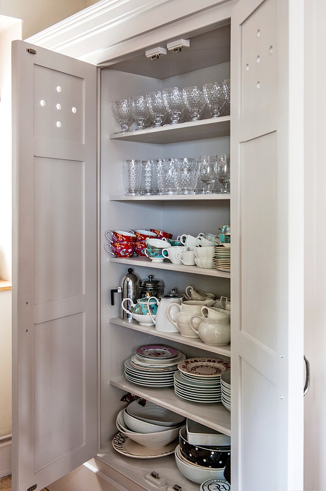 kitchen cupboard with dishes 