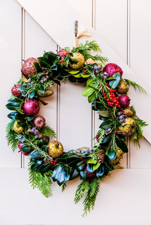 Colorful Wreath on White Barn Door