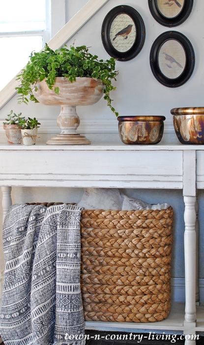 Styling a Console Table with Baskets and Vignettes