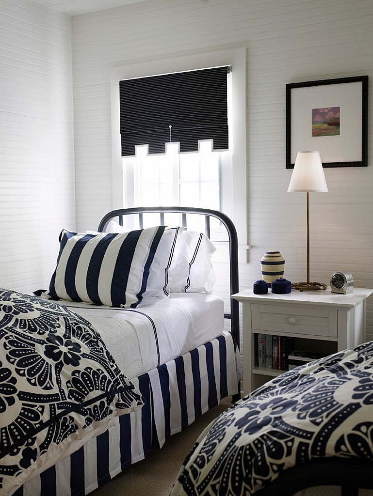 black and white bedroom with twin beds