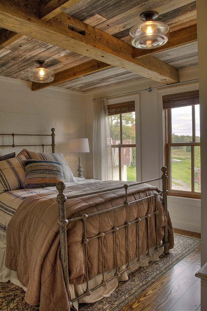 rustic bedroom with pastoral views