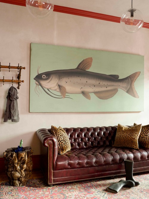 Brown Chesterfield Sofa in Living Room with Large Fish Print