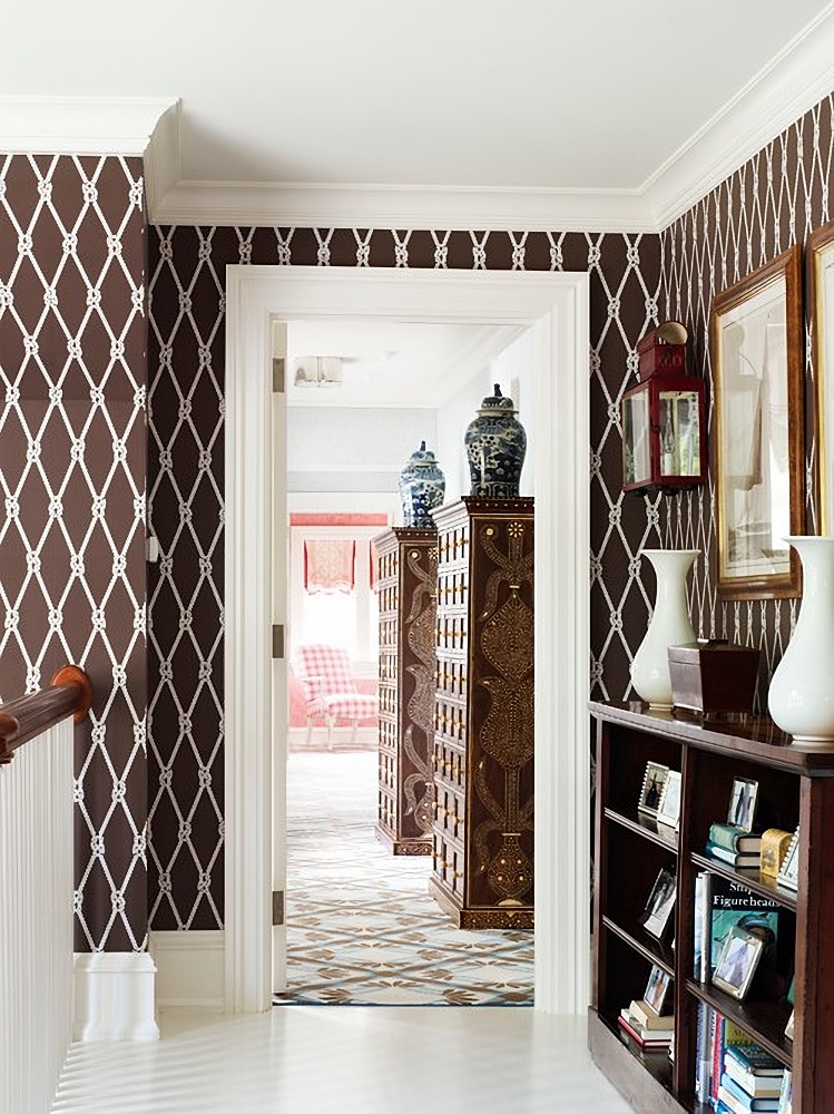 brown and white wallpapered hallway