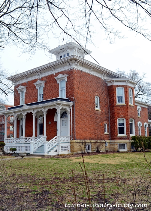 Red Brick Italianate Historic House with White Trim and Cupola