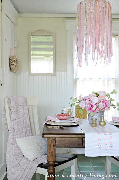 Pink and White Ribbon Chandelier above Breakfast Table