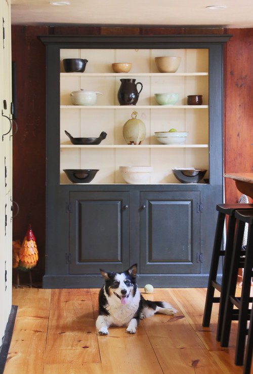How to display pottery in a vintage farmhouse cupboard.