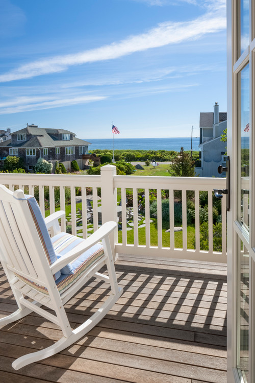 Beachfront Home Balcony with Rocking Chairs
