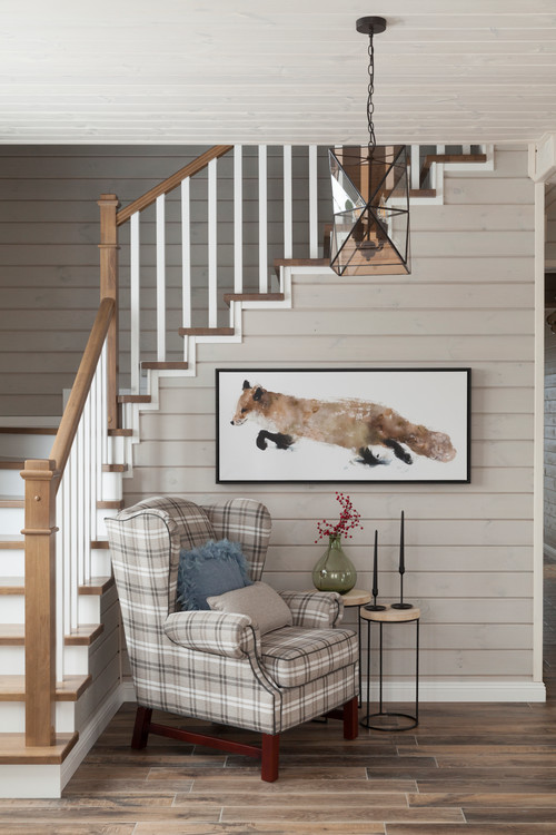 Plaid Wing Chair with Fox Painting on Wall