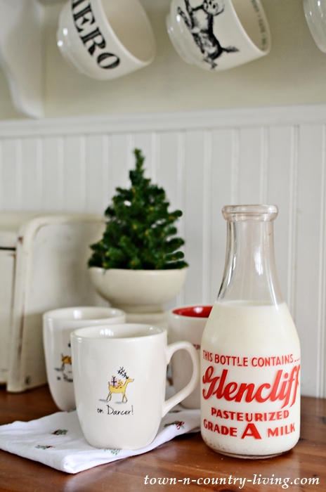 Vintage Milk Jug with Christmas Mugs in a Country Kitchen