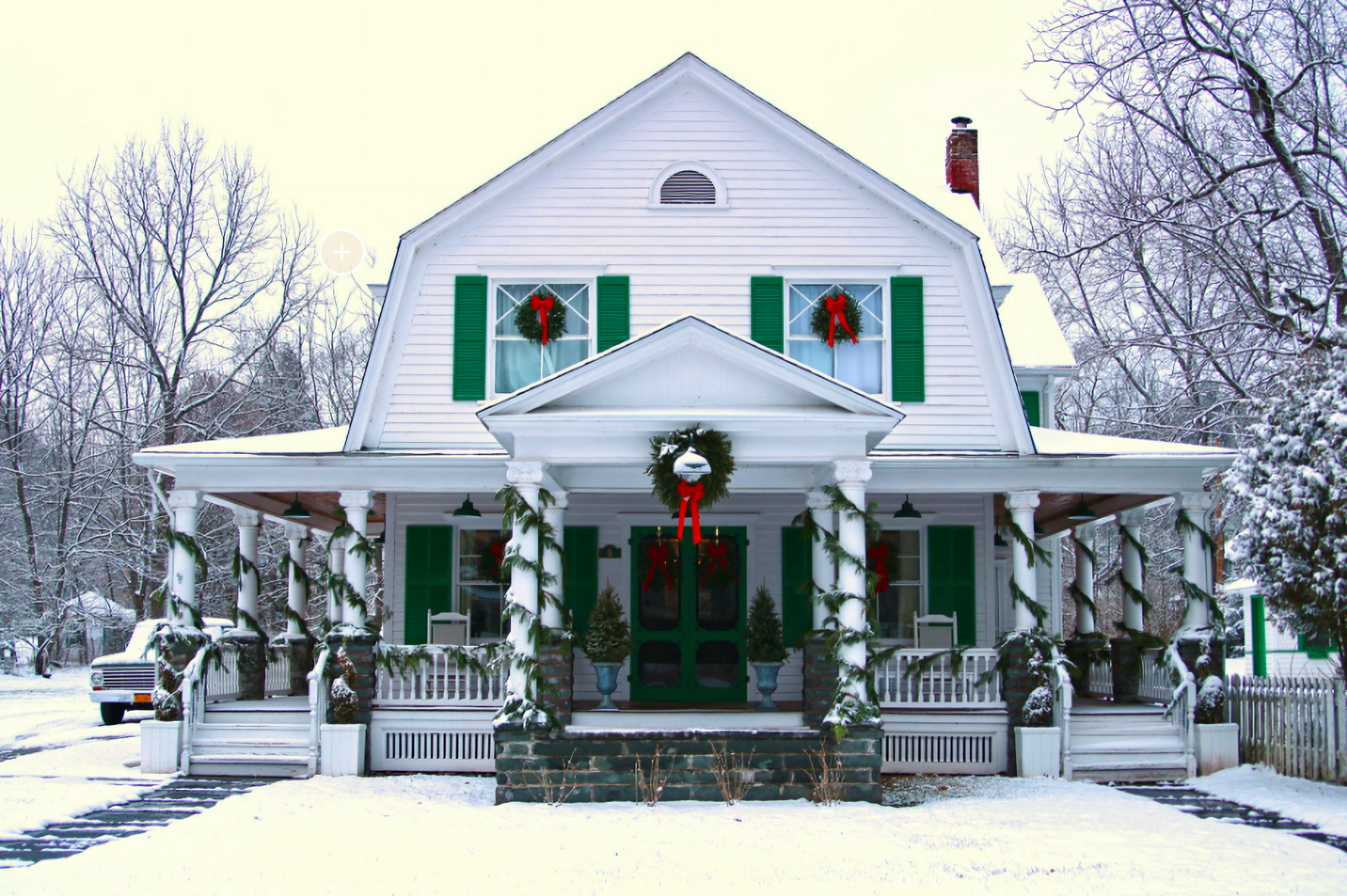 White antique farmhouse at Christmas