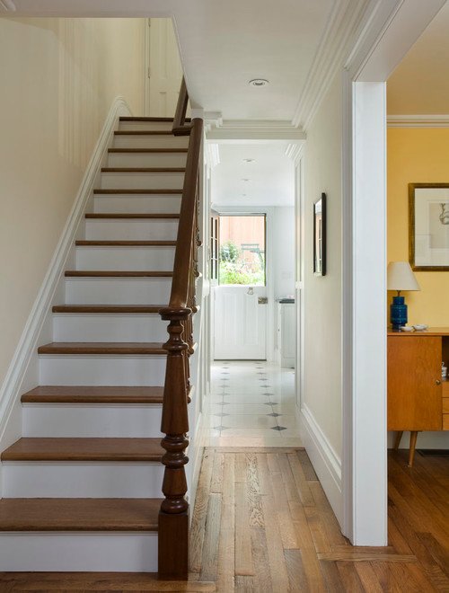 Traditional Staircase in Row House Entryway