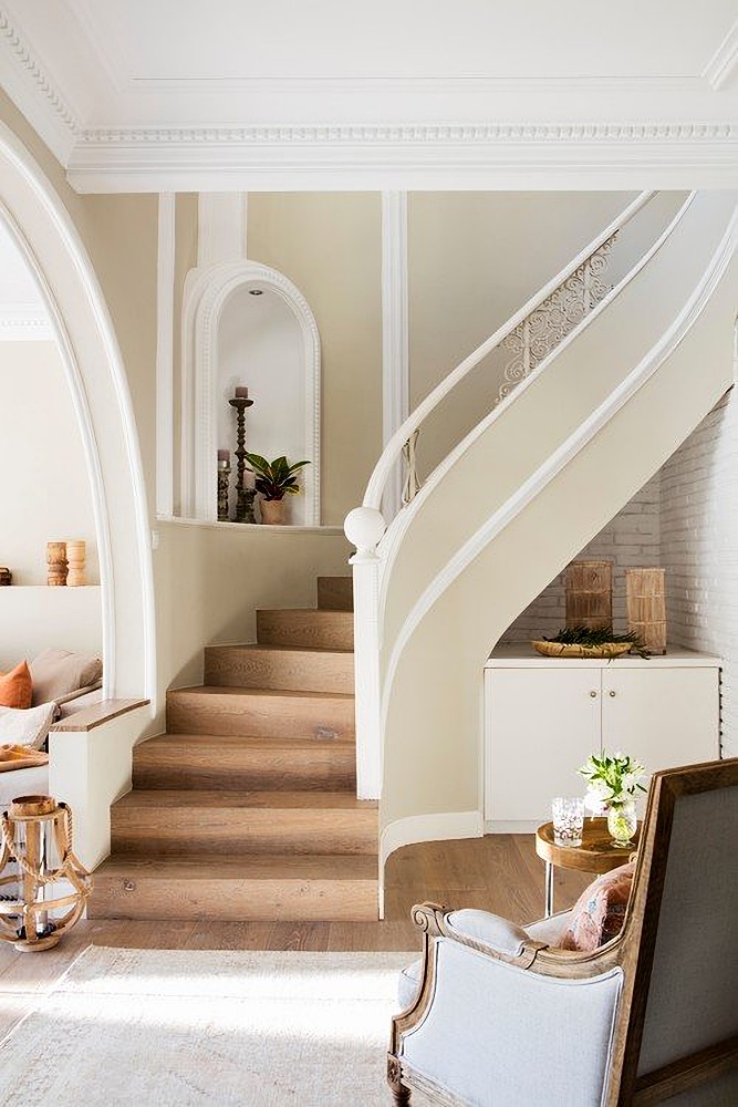 elegant curving staircase in city house