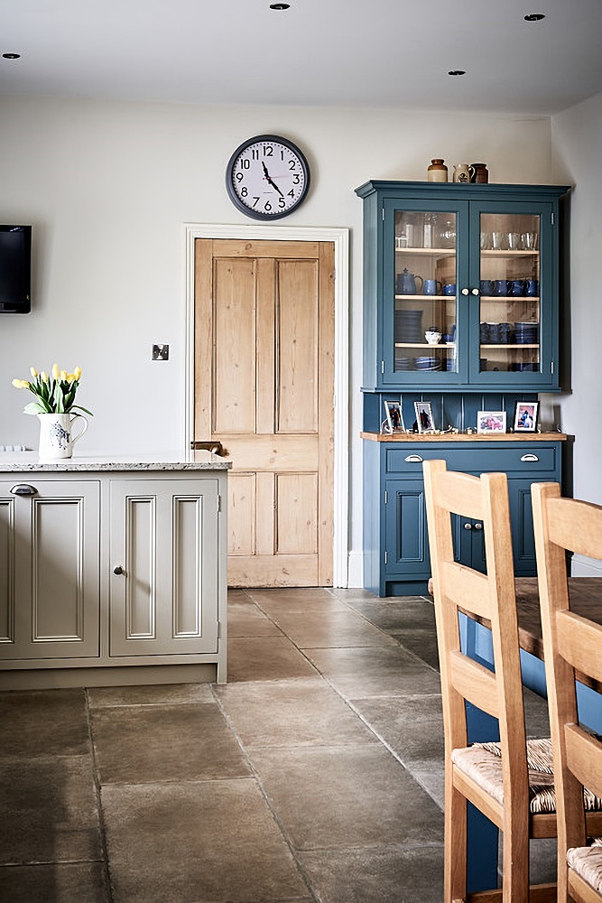 country blue farmhouse kitchen with tile floor