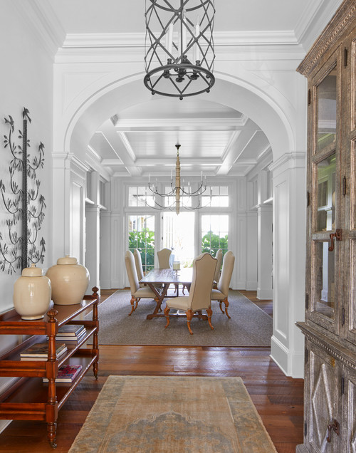 Elegant Southern Dining Room with Arched Hallway