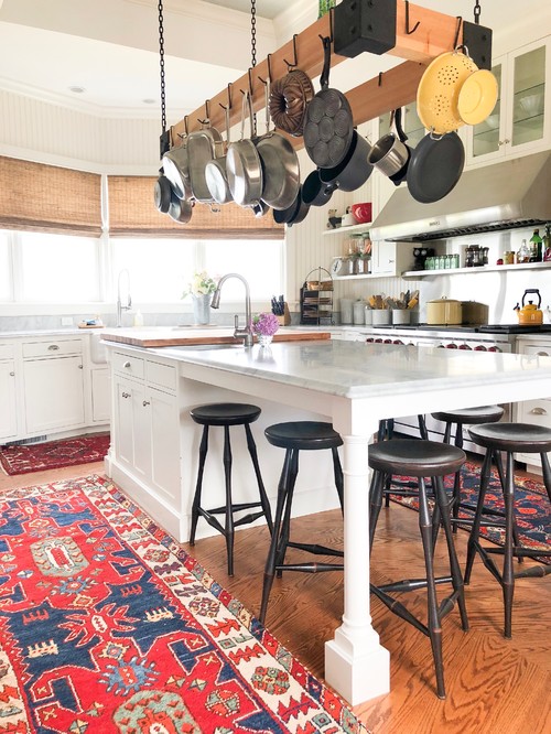White Kitchen with Colorful Oriental Rugs