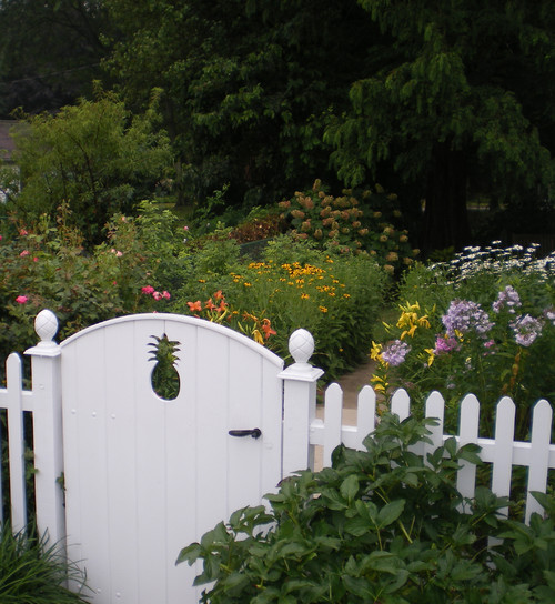 Cottage Garden with White Picket Fence