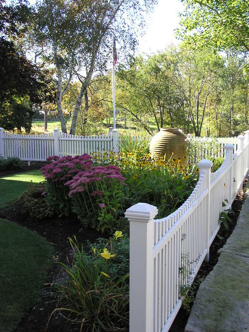 Front Yard Flower Garden with Picket Fence