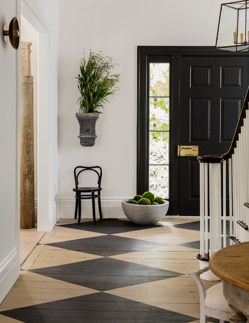 Historic Home Entryway with Checkerboard Floor