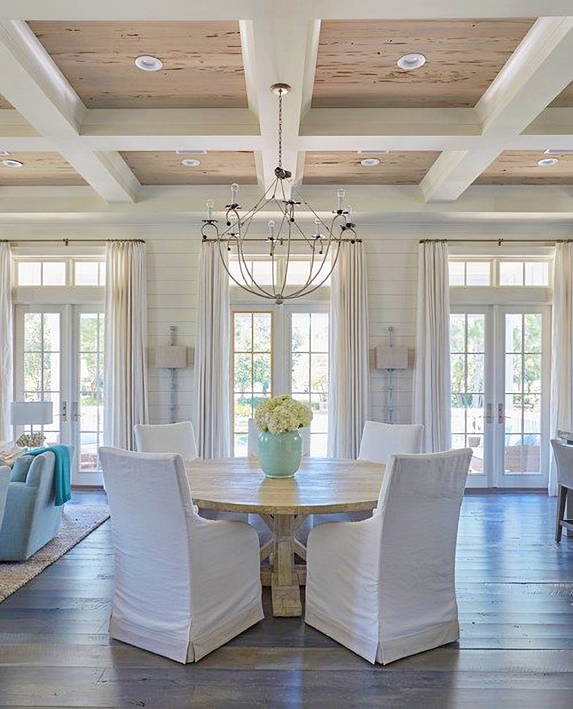 white coastal dining room with touches of blue