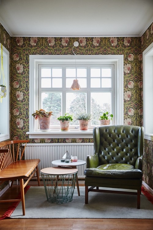 Cozy Reading Nook with Green Floral Wallpaper