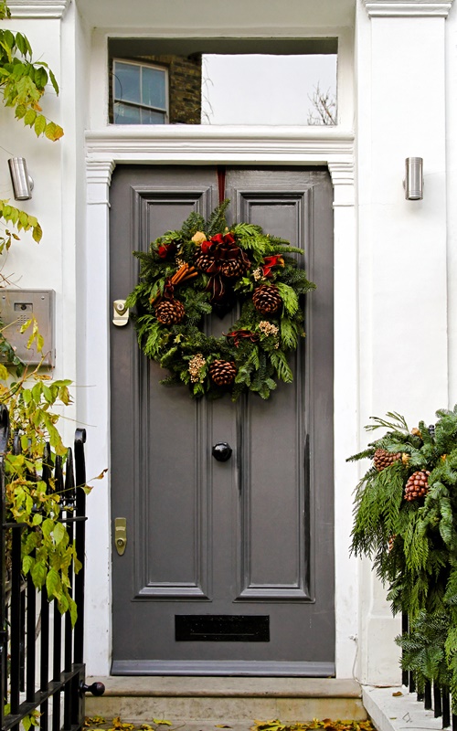 Gray Painted Door with Green Christmas Wreath