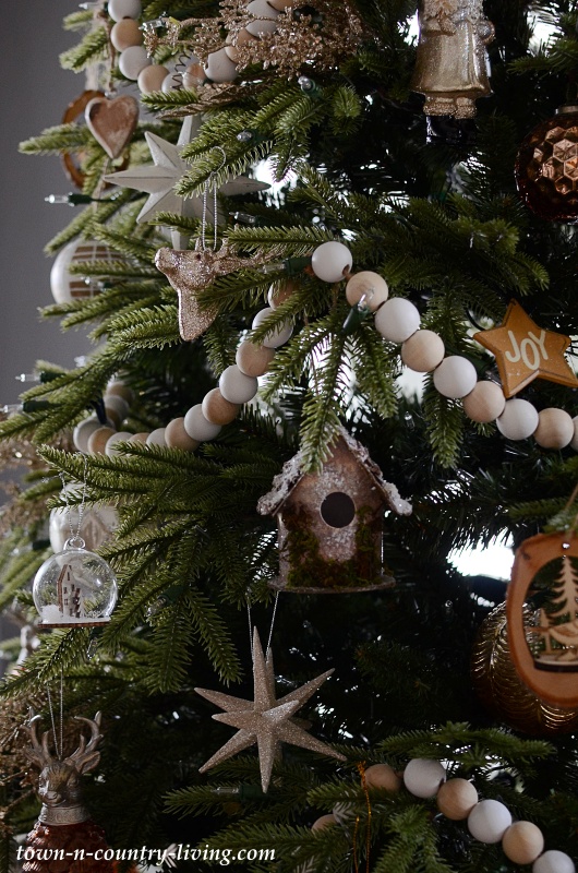 Rustic Christmas Tree with Wood Bead Garland and Nature Inspired Ornaments