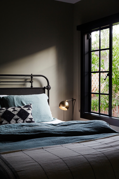 Scandinavian Style Bedroom with Linen Sheets and Comforter