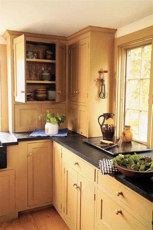 Historic Farmhouse Kitchen with Yellow Cabinets
