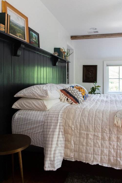 Country Style Bedroom with Dark Green Paneling for an Accent Wall