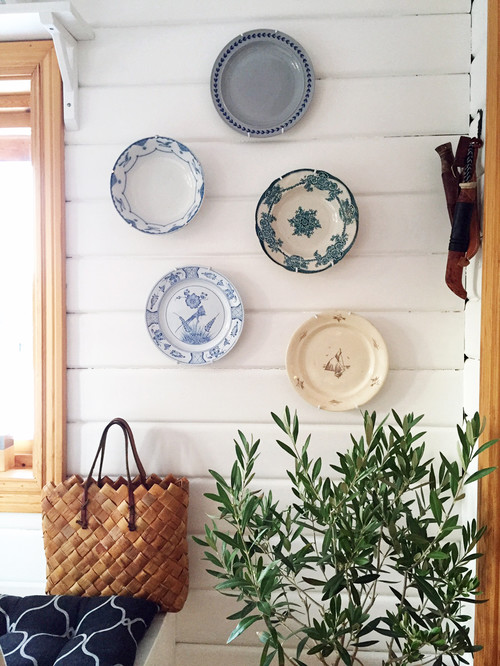 11 Unique Wall Decor Ideas For Every Room Town Country Living - White Plates Wall Decor