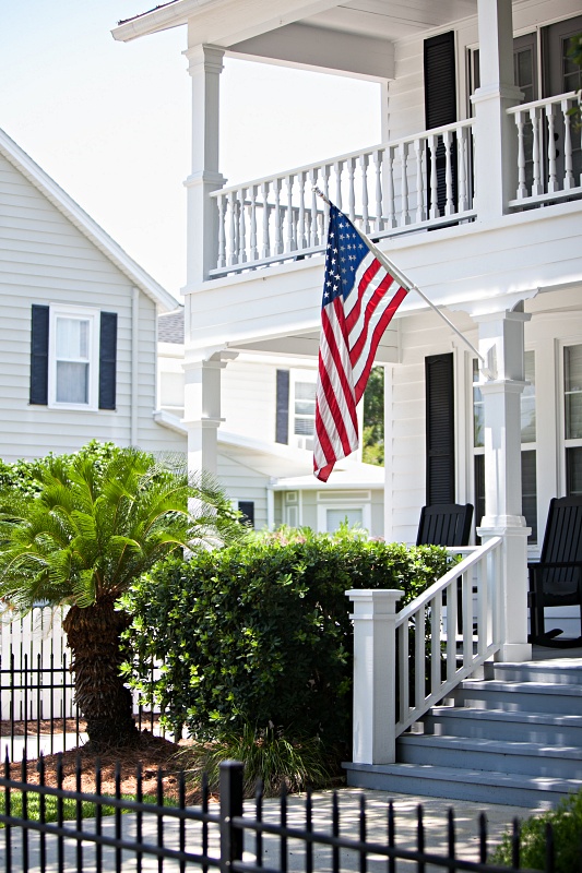 Southern Two-Story Porch with American Flag