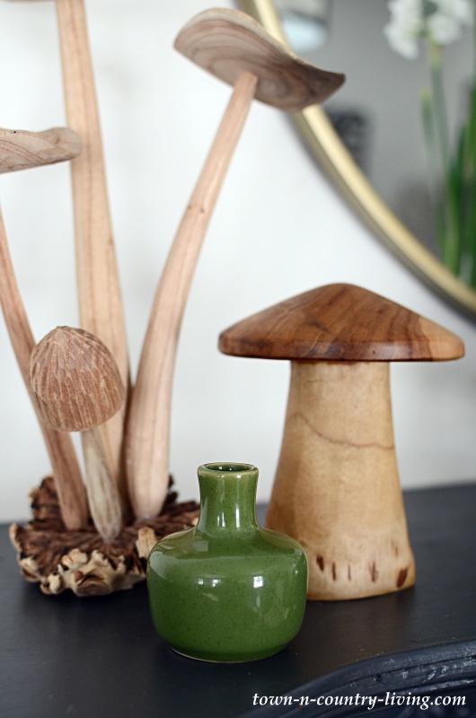 Wooden Mushrooms on a Dark Gray Mantel
