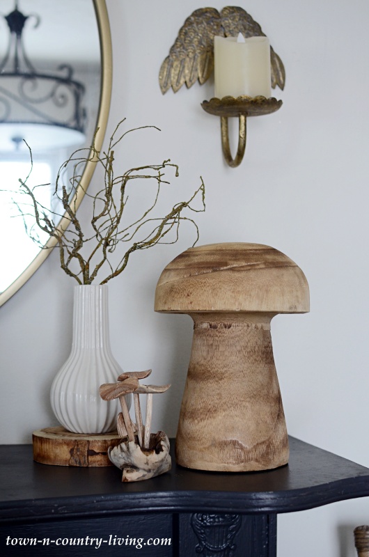 Wooden Mushrooms on a Dark Gray Mantel