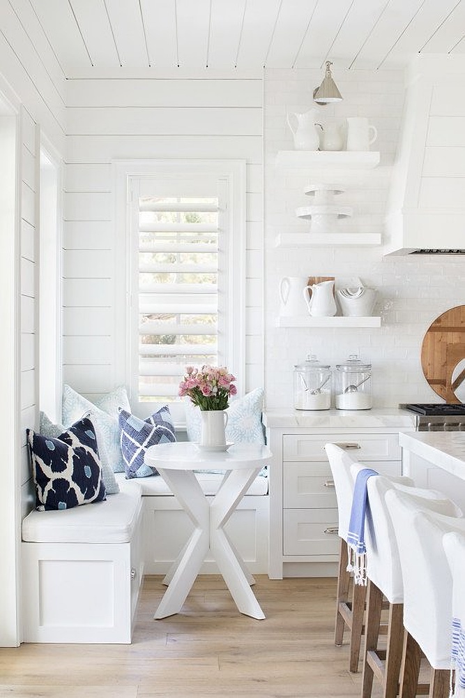 Beach style cottage kitchen in white