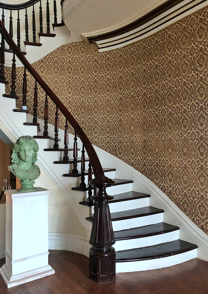 Curving staircase in historic home