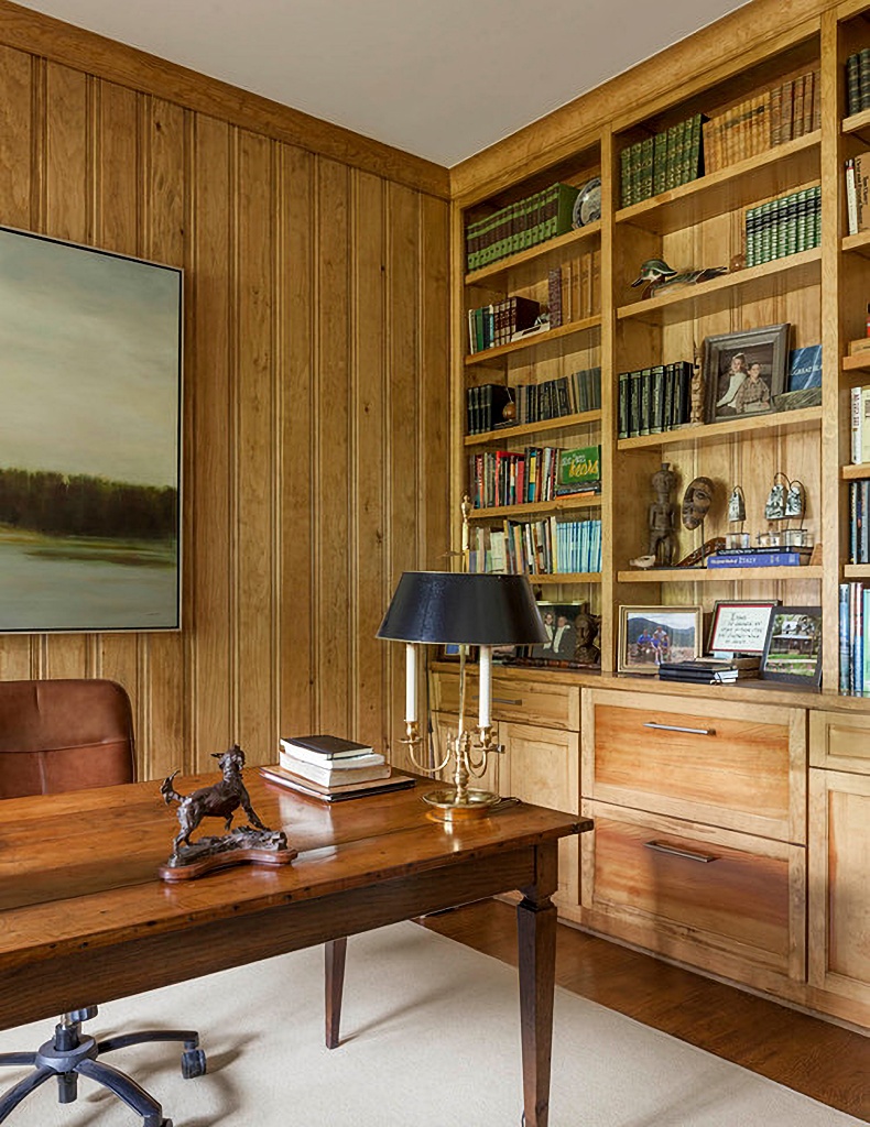 home office with wood paneling