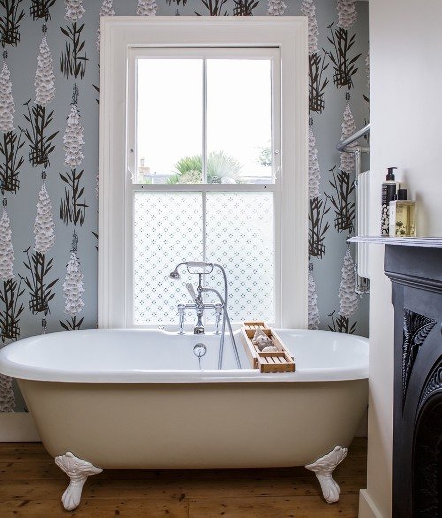 floral wallpaper in vintage bathroom