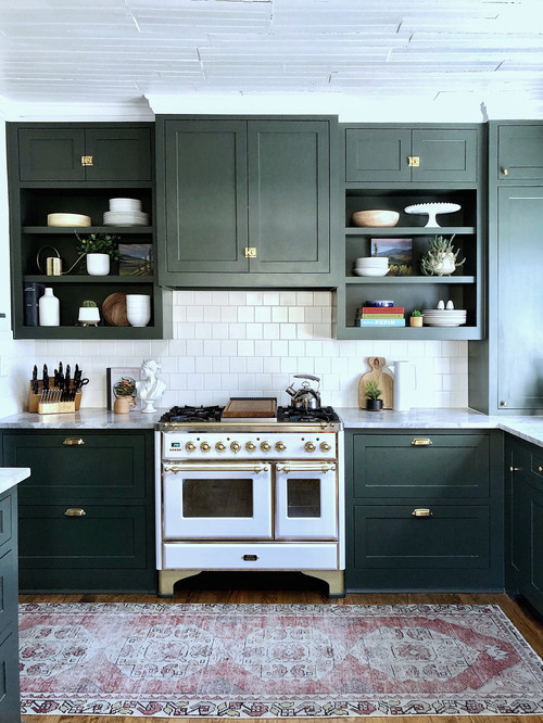 Vintage Stove and Dark Green Cabinets in Vintage Kitchen