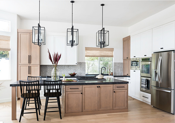 Modern Farmhouse Kitchen with Light Wood Cabinets and Black Counter Tops
