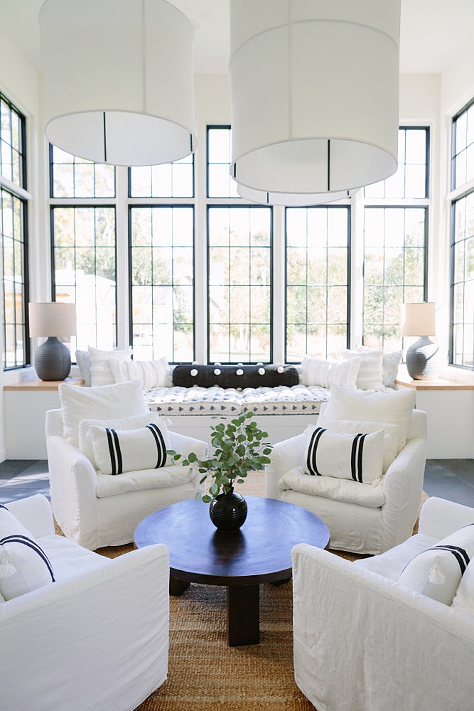white and black sunroom and pretty living rooms